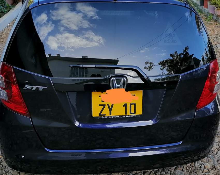 Honda Fit 2010 - 1 - Family Cars  on Aster Vender