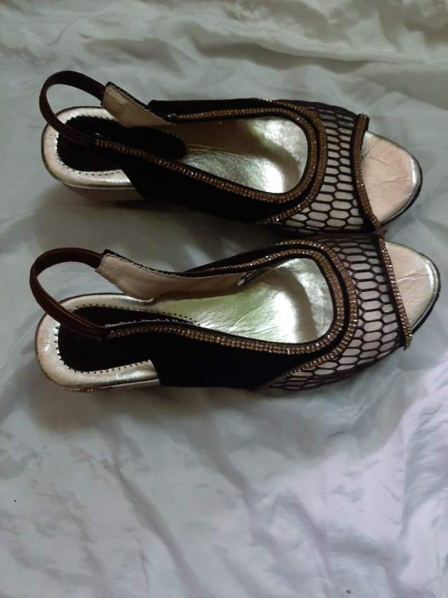 Sandals  - 1 - Sandals  on Aster Vender