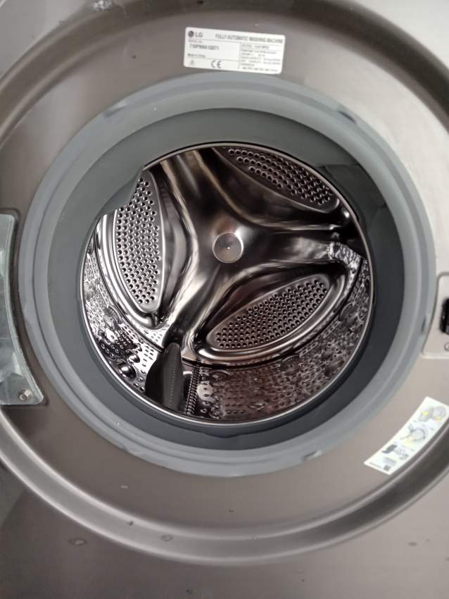 MACHINE À LAVER/ SÈCHE LINGE LG INVENTER DIRECT DRIVE 8+5KG on Aster Vender