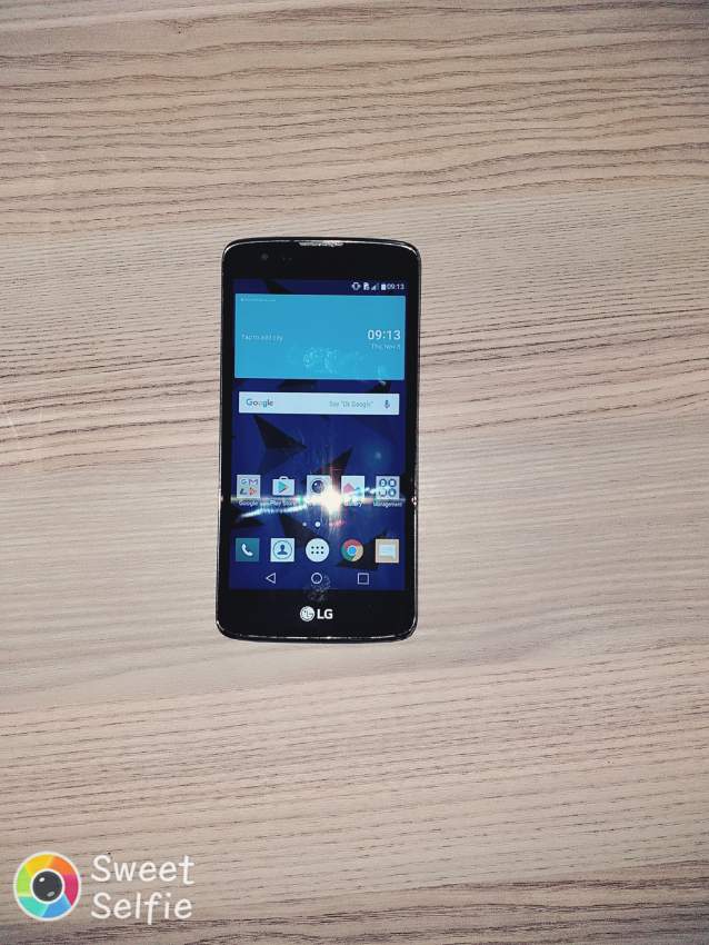 Lg k8 + headset  - 4 - Android Phones  on Aster Vender