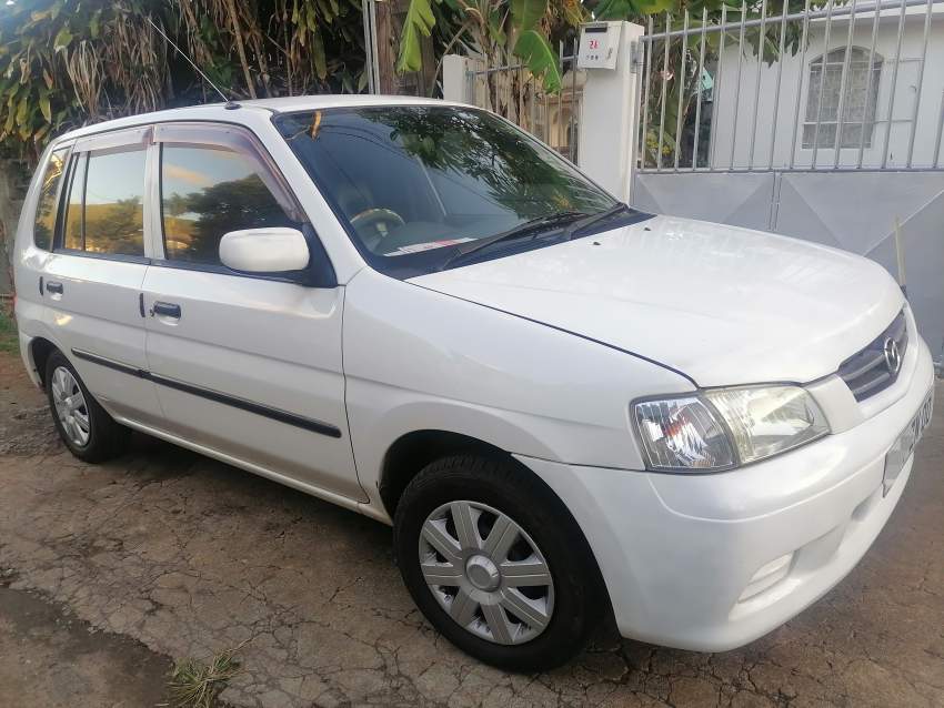 Mazda Demio  - 2 - Compact cars  on Aster Vender