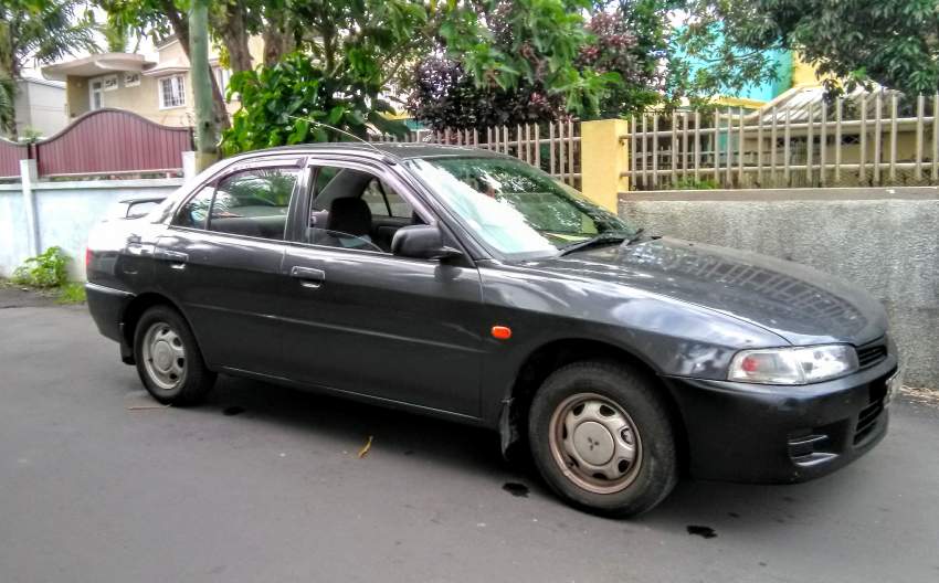 Mitsubishi Lancer GLX 1.3 Sedan - 1 - Family Cars  on Aster Vender