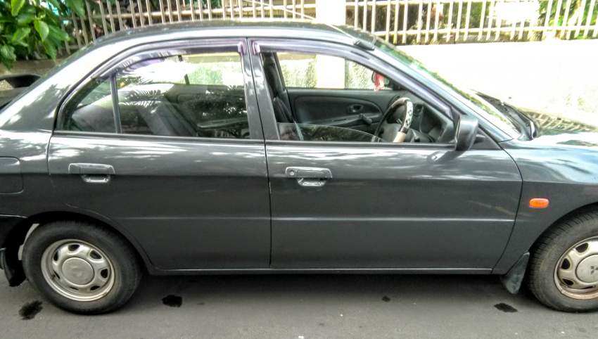 Mitsubishi Lancer GLX 1.3 Sedan - 2 - Family Cars  on Aster Vender