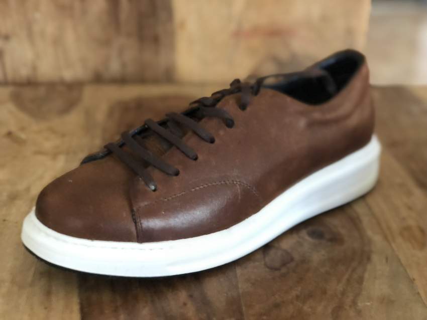 Brown young leather shoes