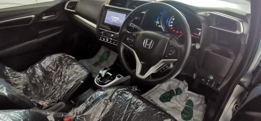 HONDA FIT HYBRID L PACKAGE - 1 - Family Cars  on Aster Vender