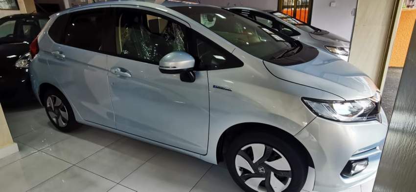 HONDA FIT HYBRID L PACKAGE - 5 - Family Cars  on Aster Vender