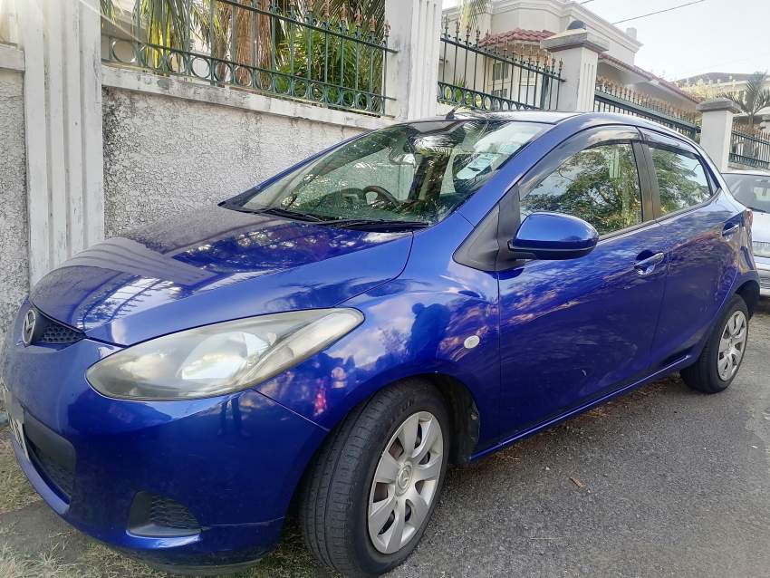 Mazda Demio Year 2009 - 7 - Compact cars  on Aster Vender