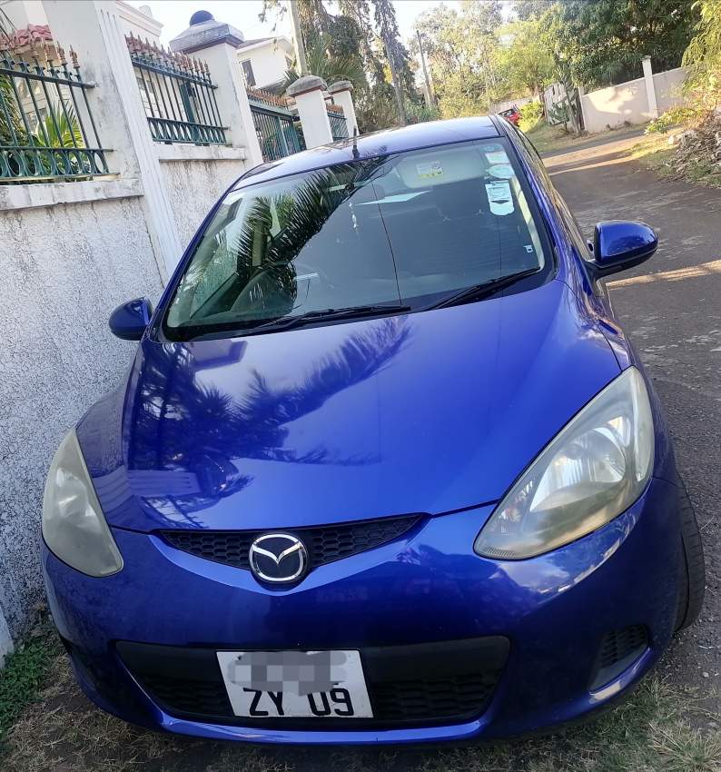 Mazda Demio Year 2009 - 0 - Compact cars  on Aster Vender