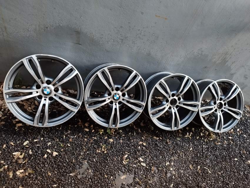 BMW rims set for repair or parts on Aster Vender