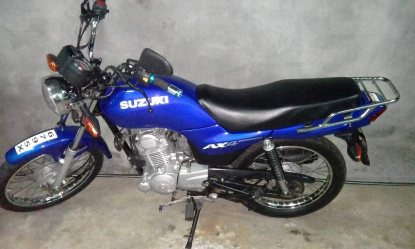 Suzuki Ax 4 blue motorcycle - 0 - Roadsters  on Aster Vender