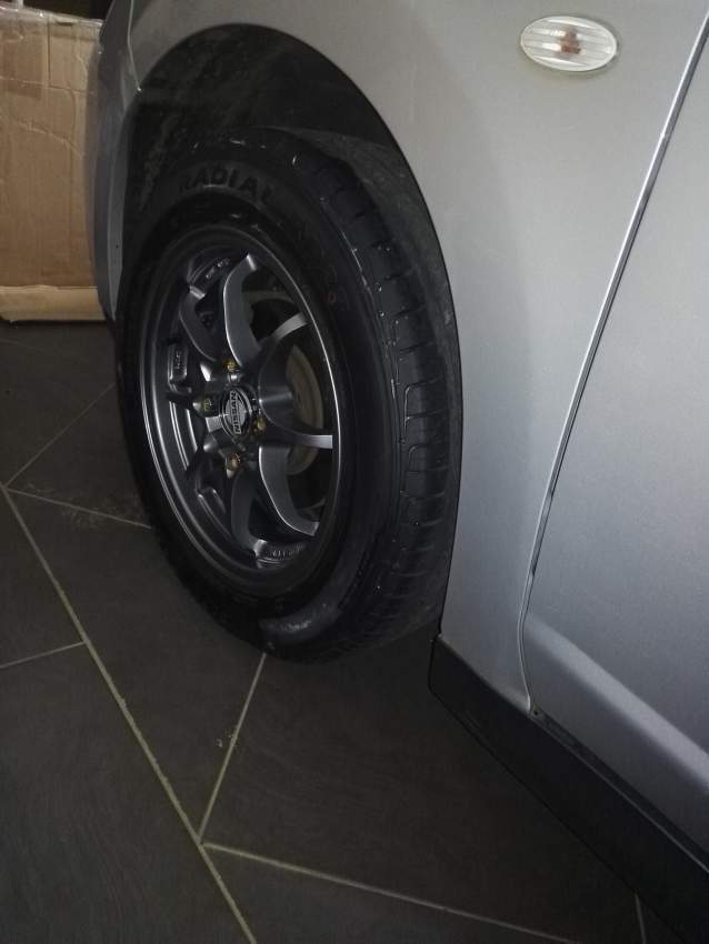 Nissan Tiida 1598cc - 4 - Family Cars  on Aster Vender