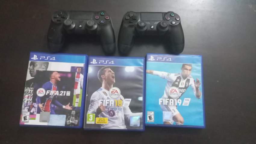 PLAYSTATION 4 Slim - 1TB with Wireless Controllers & FIFA 18, 19, 21. - 2 - PlayStation 4 (PS4)  on Aster Vender