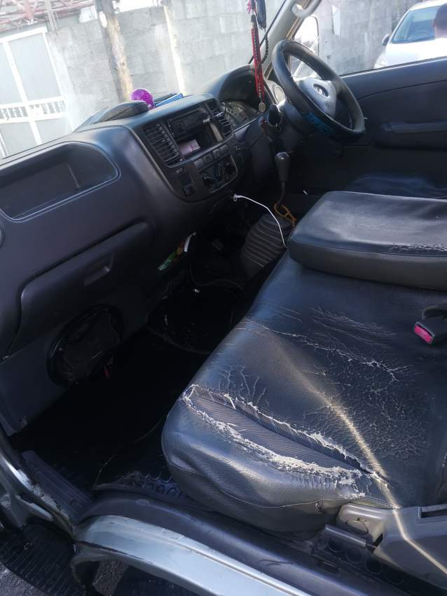 Nissan E25 Yr06 - 1 - Passenger Van  on Aster Vender