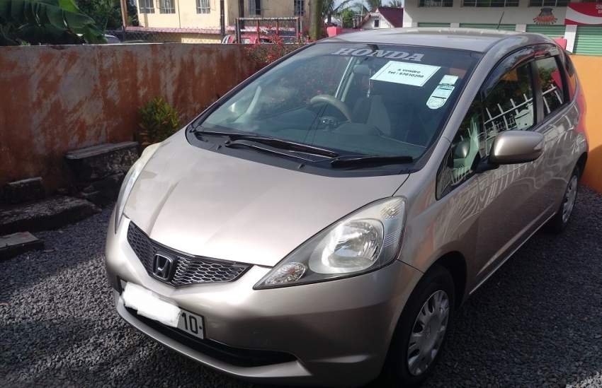 Honda Fit 1330cc - 1 - Family Cars  on Aster Vender
