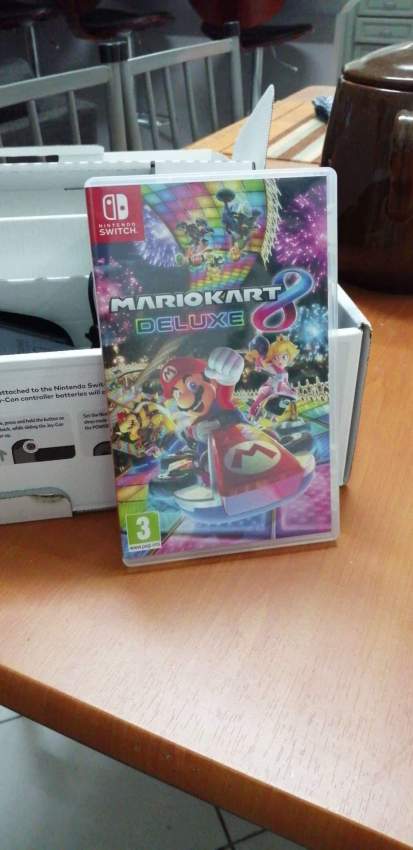 Nintendo switch + Mario Kart Deluxe 8 - 2 - PS4, PC, Xbox, PSP Games  on Aster Vender