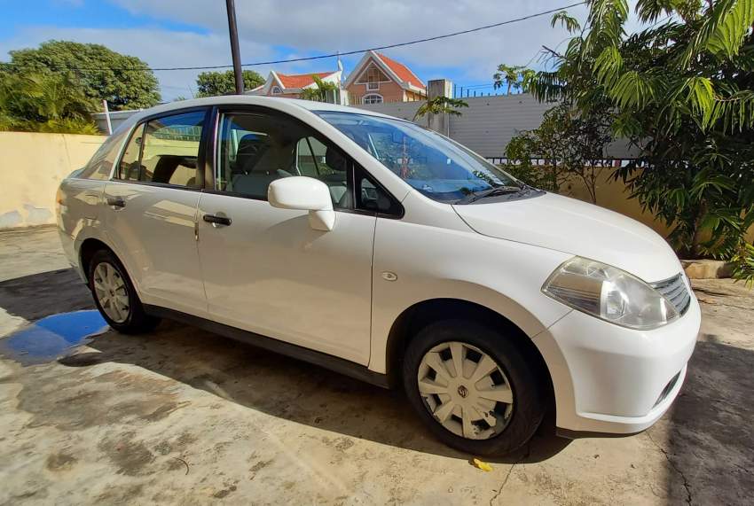 Nissan Tiida - 1 - Family Cars  on Aster Vender