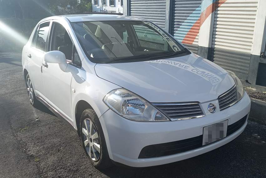 Nissan Tiida - 5 - Family Cars  on Aster Vender