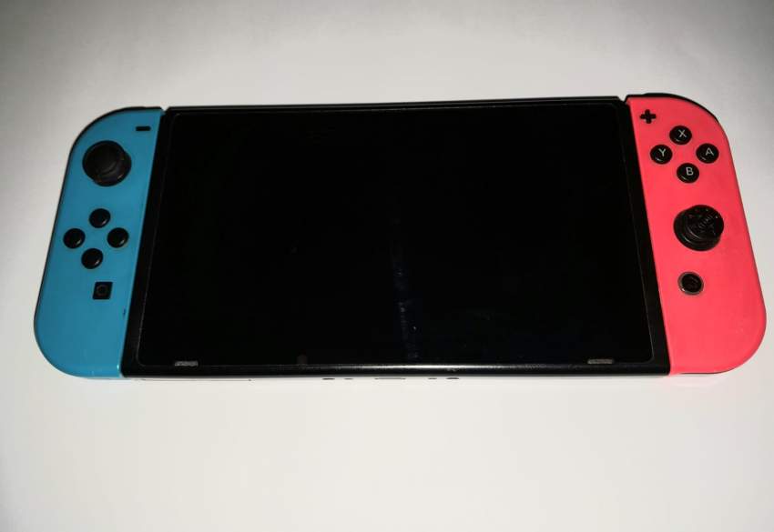 Nintendo switch + all accessories + all games  on Aster Vender