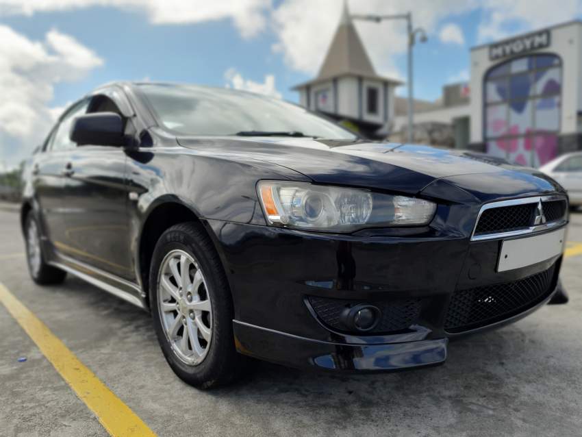 Mitsubishi Lancer Ex 2009 - 1 - Family Cars  on Aster Vender
