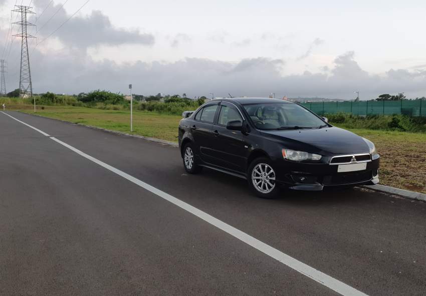 Mitsubishi Lancer Ex 2009 - 4 - Family Cars  on Aster Vender