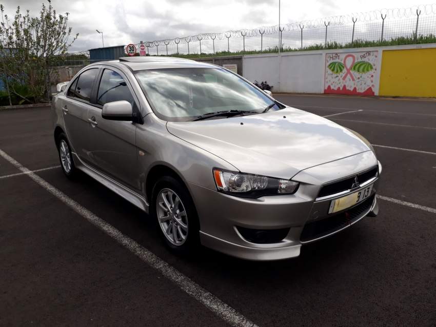 Mitsubishi Lancer Ex - 2 - Family Cars  on Aster Vender