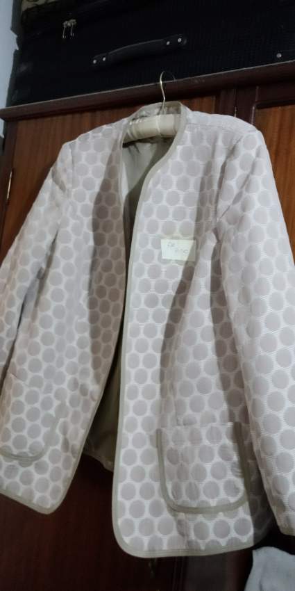 Veste habillée neuve du Canada. on Aster Vender