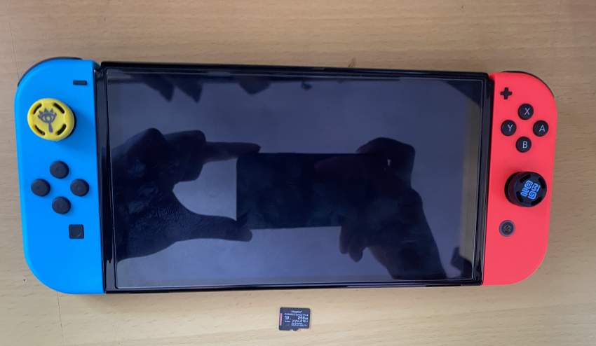 Nitendo switch Oled (Original)+ 256 GB sd card on Aster Vender