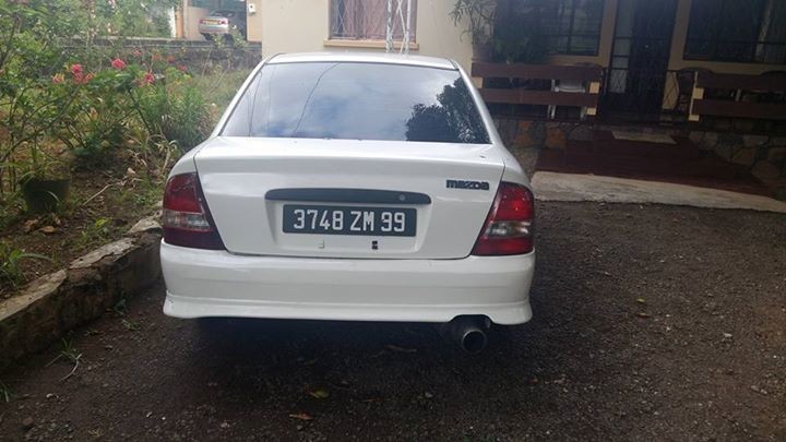 MAZDA 323 SEDAN 1999 - 3 - Family Cars  on Aster Vender