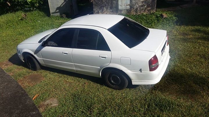 MAZDA 323 SEDAN 1999 - 1 - Family Cars  on Aster Vender