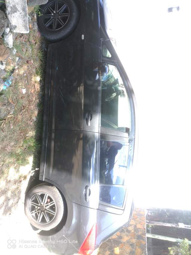 nissan latio 05 automatic - 0 - Family Cars  on Aster Vender