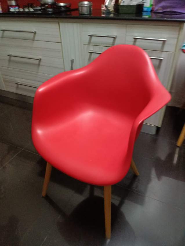 Hard plastic chairs with wooden legs