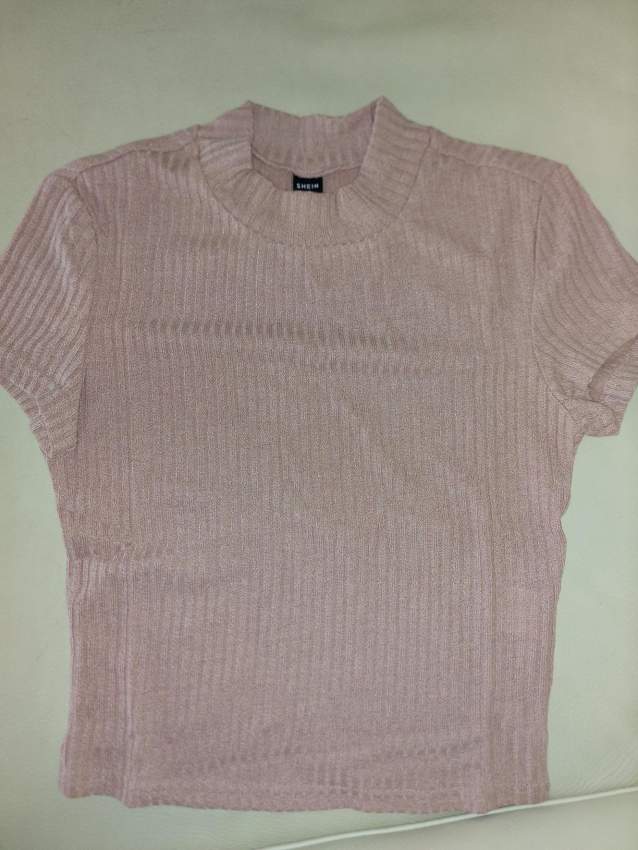Turtle neck pink top on Aster Vender