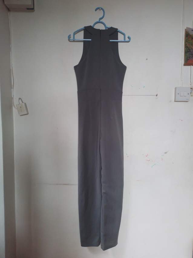 Grey jumpsuit on Aster Vender