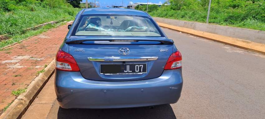 Toyota(Yaris) Sedan - 1 - Compact cars  on Aster Vender