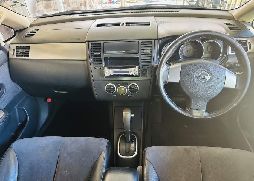 Nissan Tida - 5 - Compact cars  on Aster Vender