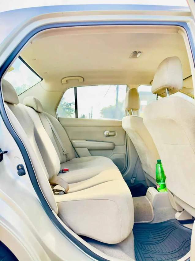 NISSAN LATIO 2005 - 10 - Family Cars  on Aster Vender