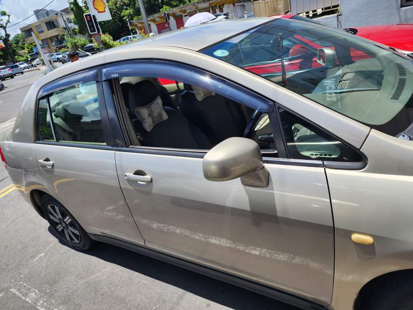 Nissan Tiida - 1 - Family Cars  on Aster Vender