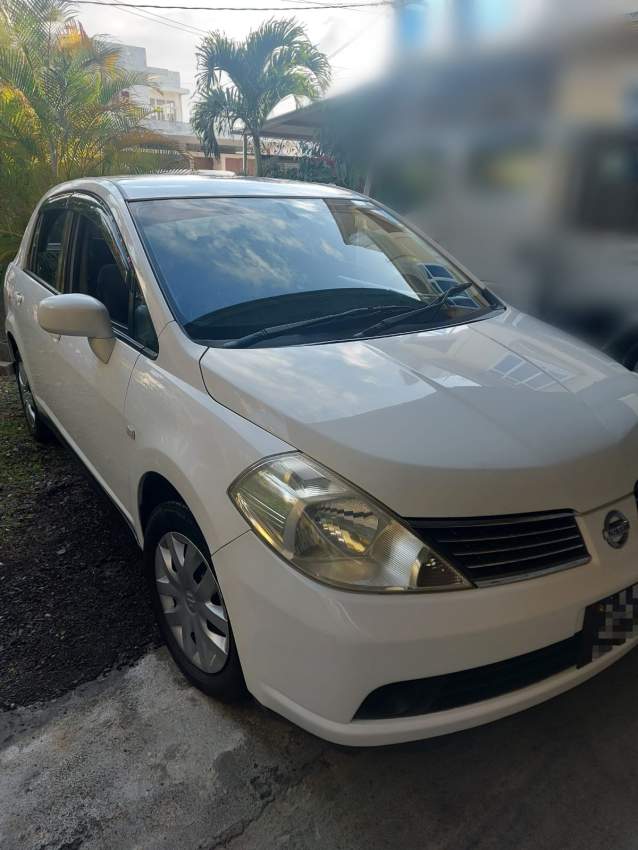 Nissan Tida Year 2004 - 1 - Family Cars  on Aster Vender