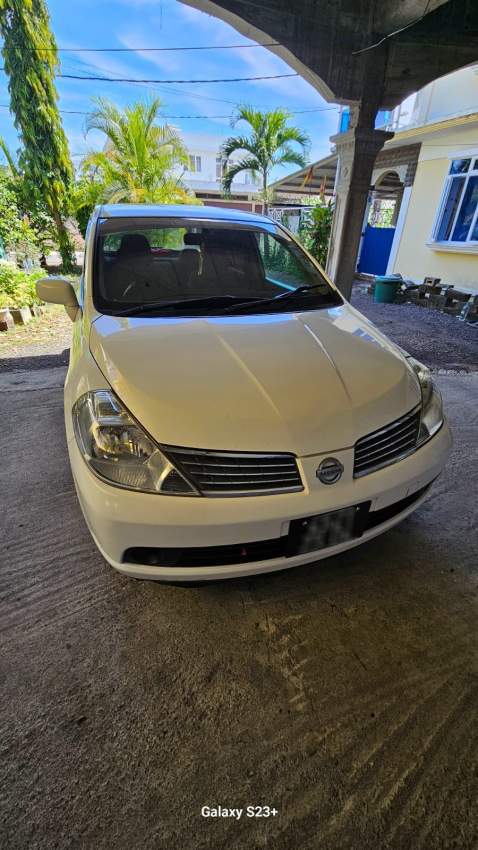 Nissan Tida Year 2004 - 2 - Family Cars  on Aster Vender