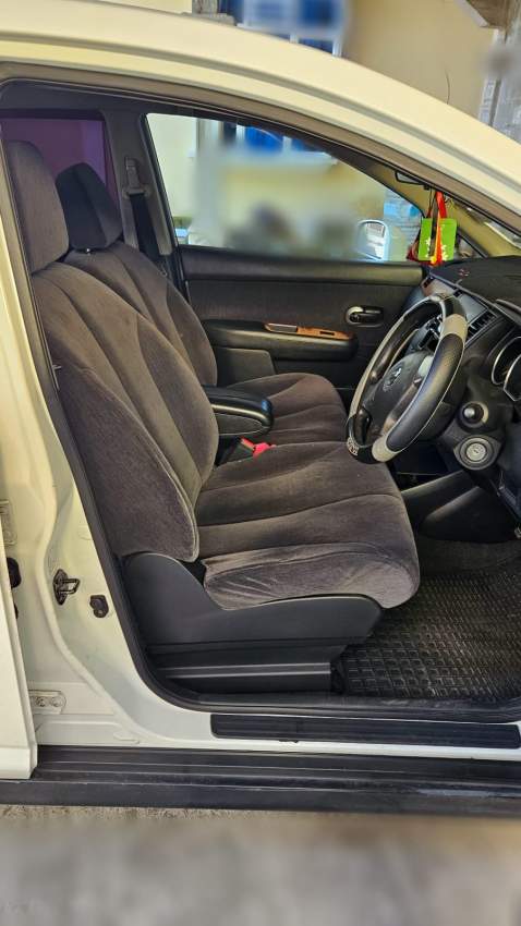 Nissan Tida Year 2004 - 4 - Family Cars  on Aster Vender