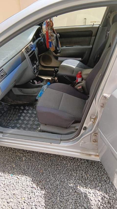 Chevrolet Optra Year 2006 - 3 - Family Cars  on Aster Vender