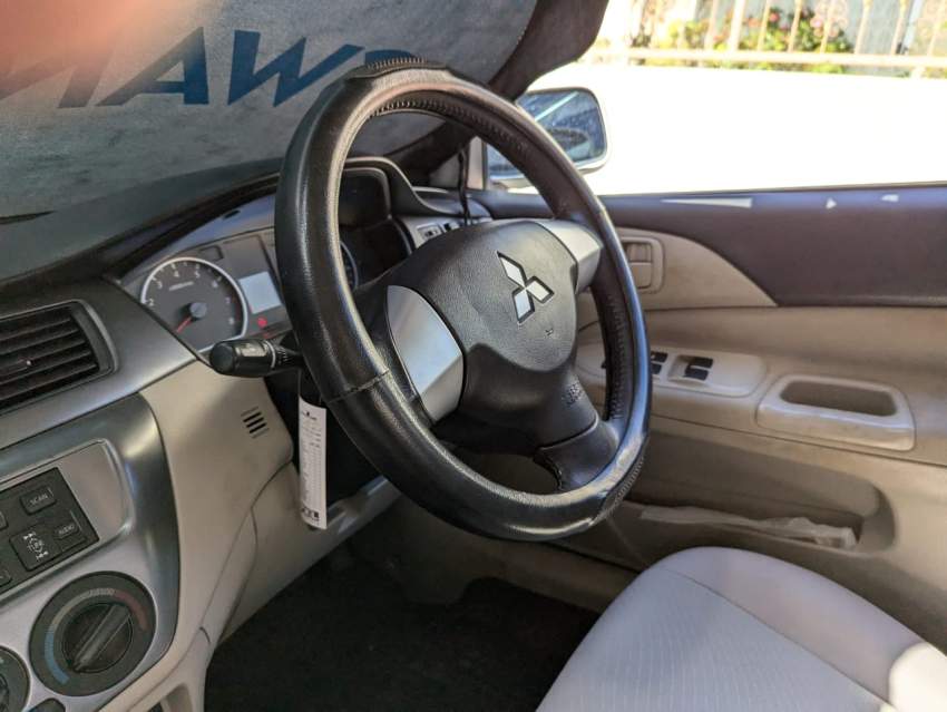 Mitsubishi Lancer GLX Saloon Colour White - 3 - Family Cars  on Aster Vender