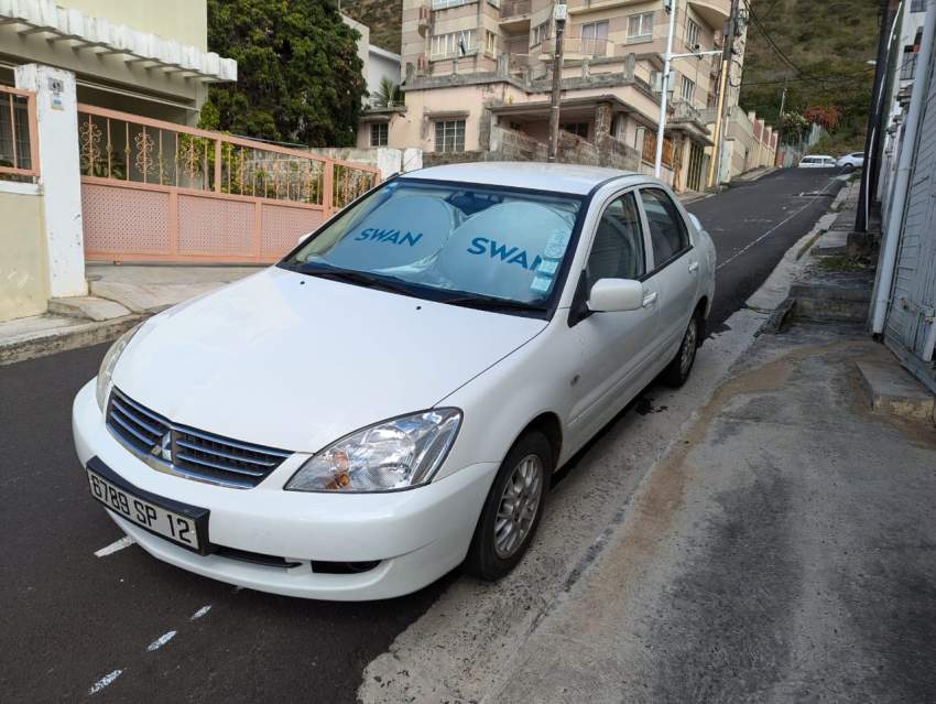 Mitsubishi Lancer GLX Saloon Colour White - 0 - Family Cars  on Aster Vender