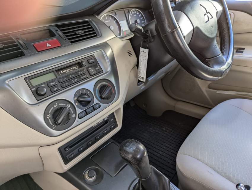 Mitsubishi Lancer GLX Saloon Colour White - 2 - Family Cars  on Aster Vender