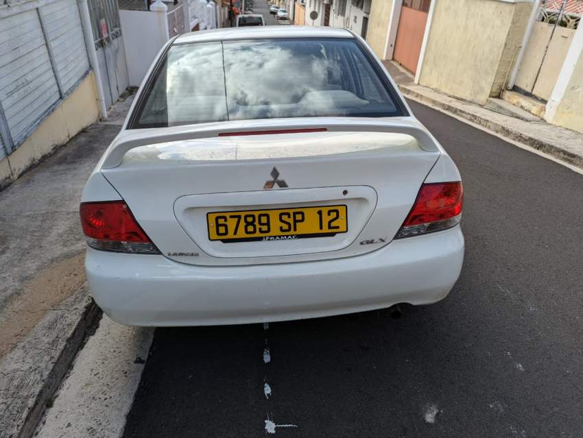 Mitsubishi Lancer GLX Saloon Colour White - 5 - Family Cars  on Aster Vender