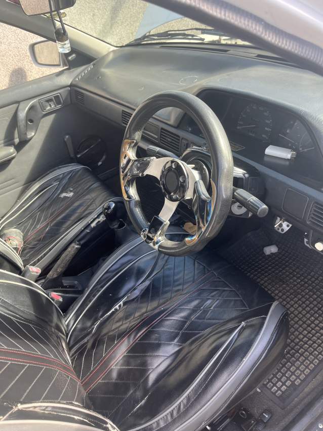 Mazda 323 (ZG 94) - 0 - Compact cars  on Aster Vender