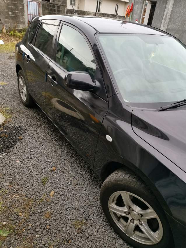 Mazda Axela 2005 - 2 - Family Cars  on Aster Vender