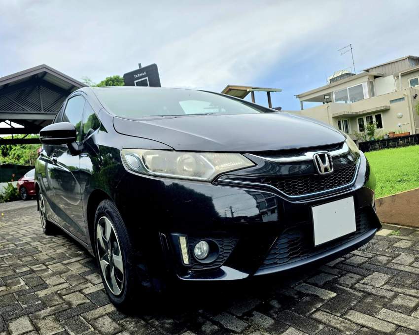 Honda Fit Hybrid Japan 2017 - 2 - Family Cars  on Aster Vender