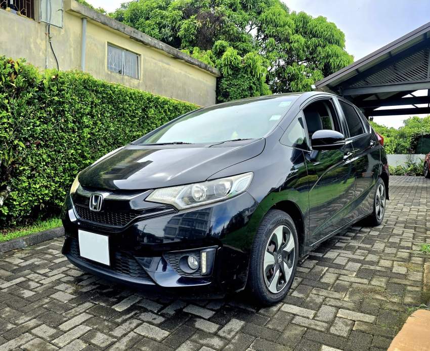 Honda Fit Hybrid Japan 2017 - 1 - Family Cars  on Aster Vender