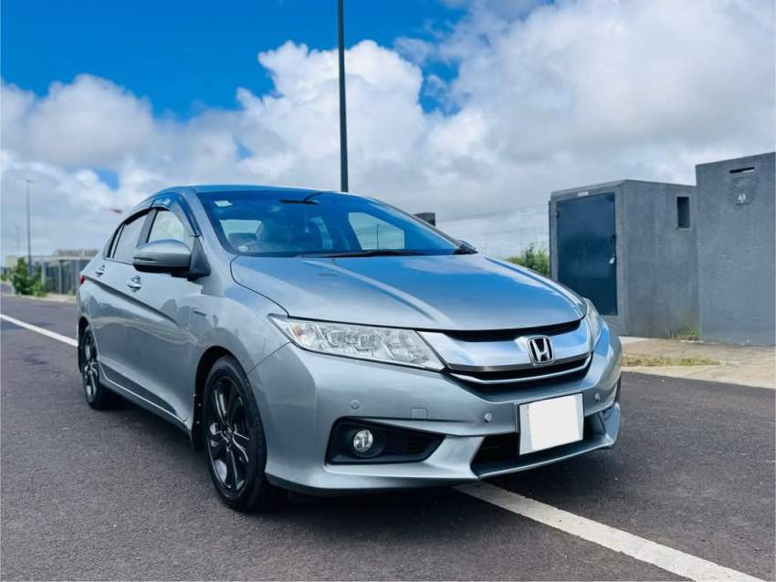 Honda Grace Hybrid 2016 - 1 - Family Cars  on Aster Vender
